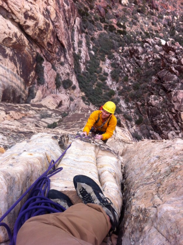Simon is all smiles on top of the crux pitch.
