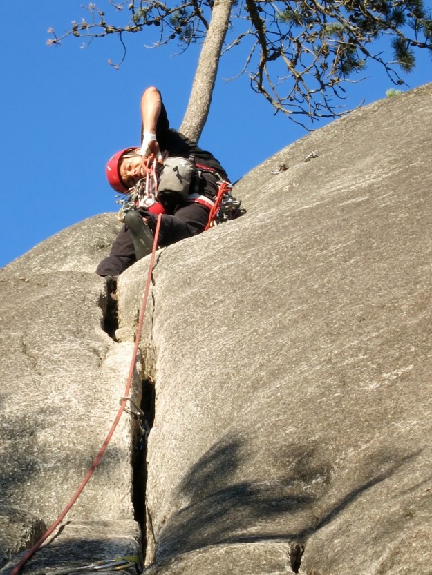 Clipping the chains on his first lead.